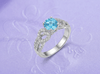 Natural Blue Topaz Twist Ring in Sterling Silver by AME Jewellery. 