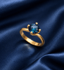Nhẫn vàng 14K đá quý tự nhiên London Blue Topaz thiết kế kiểu twist - AME Jewellery