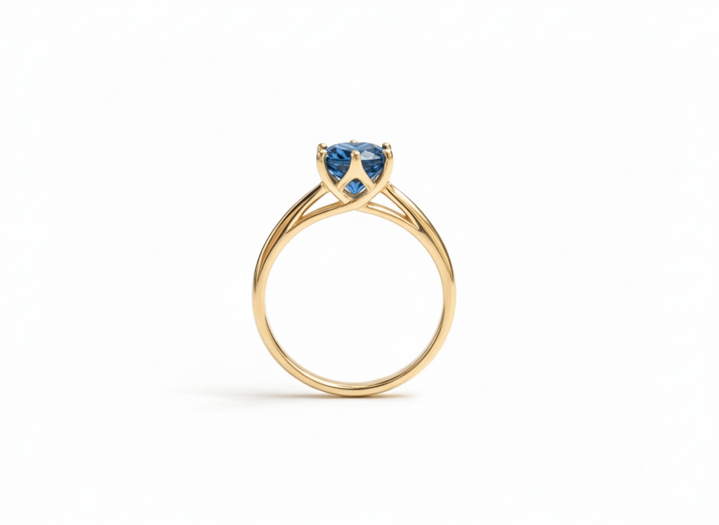 Natural Blue Topaz Twist Ring in 14K Yellow Gold by AME Jewellery.