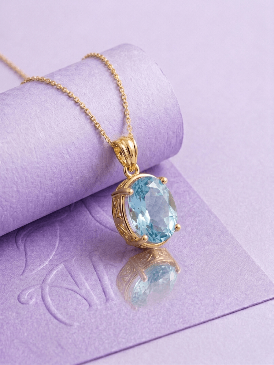 Natural Oval-cut Blue Topaz Pendant Necklace in 14K Yellow Gold by AME Jewellery