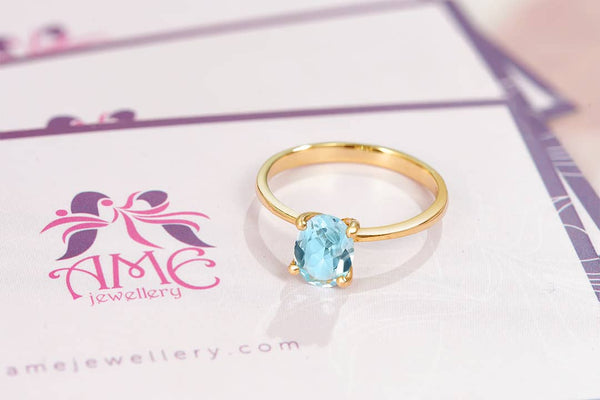 Natural oval Blue Topaz Ring in 14K Yellow Gold by AME Jewellery