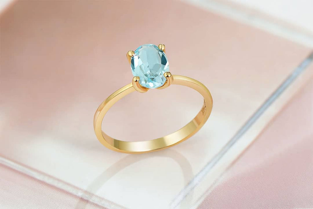 Natural oval Blue Topaz Ring in 14K Yellow Gold by AME Jewellery