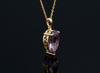 Discover the captivating beauty and elegance of the Natural Pear-cut Ametrine Pendant Necklace, crafted in 14K yellow gold by AME Jewellery. 