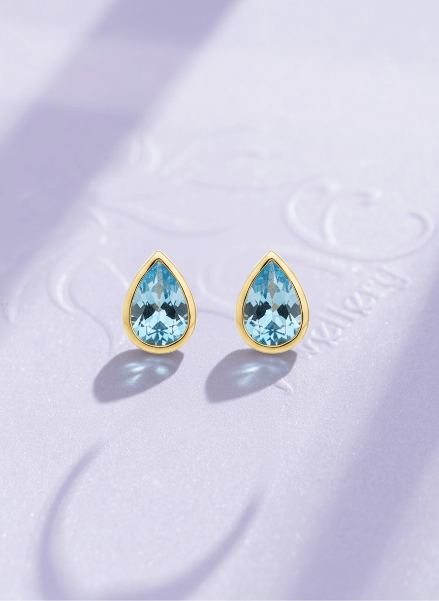 Bông tai Đá quý thiên nhiên Pear-cut Blue Topaz Bezel Earrings in 14K Yellow Gold | AME Jewellery