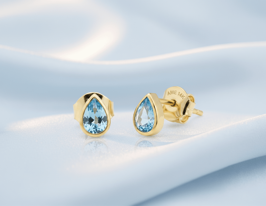 Bông tai Đá quý thiên nhiên Pear-cut Blue Topaz Bezel Earrings in 14K Yellow Gold | AME Jewellery