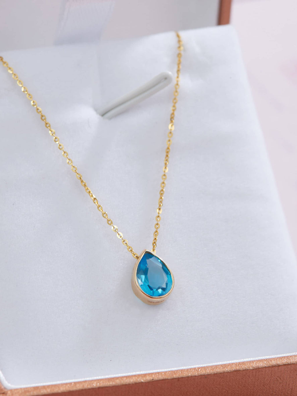 pear-blue-topaz-gold-pendant-pg1217-1