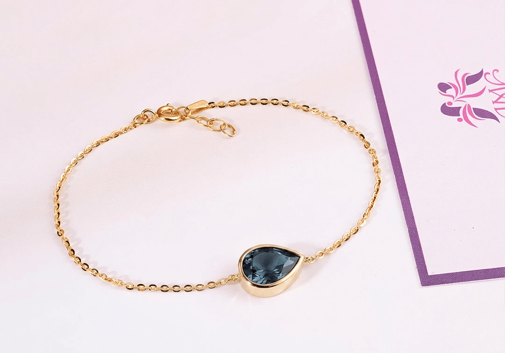 Lắc vàng đá quý tự nhiên Natural Pear-cut London Blue Topaz Bracelet in 14K Yellow Gold by AME Jewellery