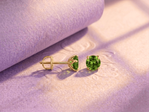 Natural Peridot Stud Earrings in 14-karat Yellow Gold by AME Jewellery. 