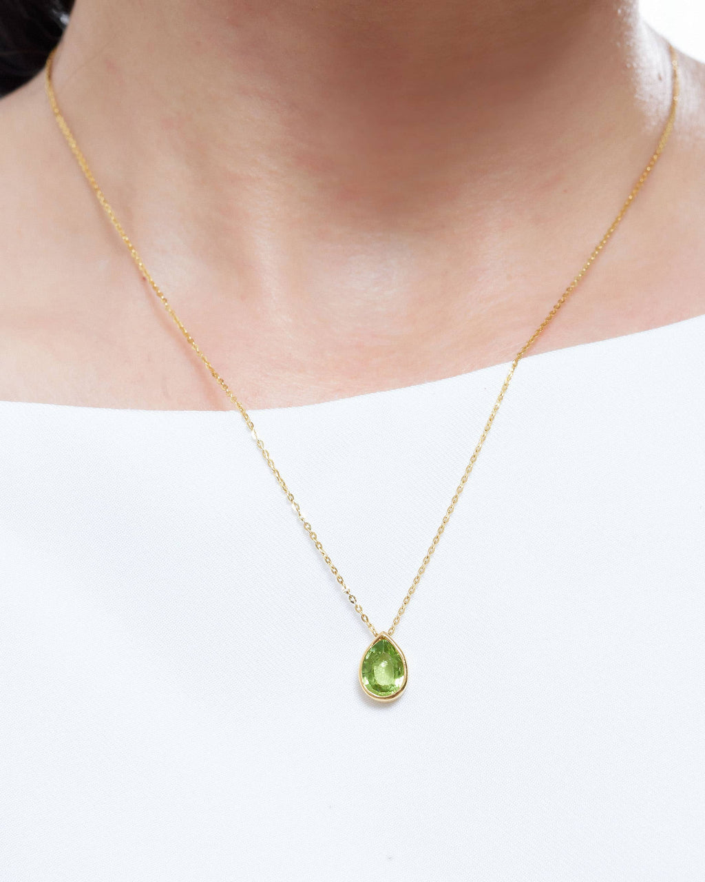 Mặt dây chuyền Đá quý thiên nhiên Pear-cut Peridot Bezel Pendant in 14K Yellow Gold by AME Jewellery