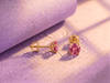 Natural pink topaz 4-prong earrings in 14K yellow gold by AME Jewellery.