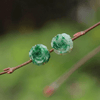 Inspired by the timeless beauty of roses, these elegant Myanmar jade earrings are handcrafted in 14K yellow gold by AME Jewellery.
