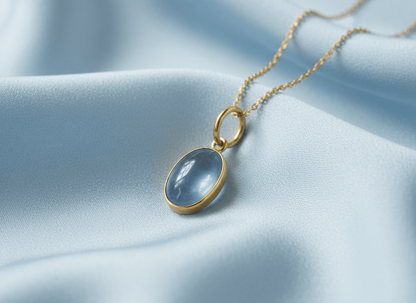 Double-sided Oval Cabochon Blue Sapphire Bezel Pendant Necklace in 14K Yellow Gold by AME Jewellery