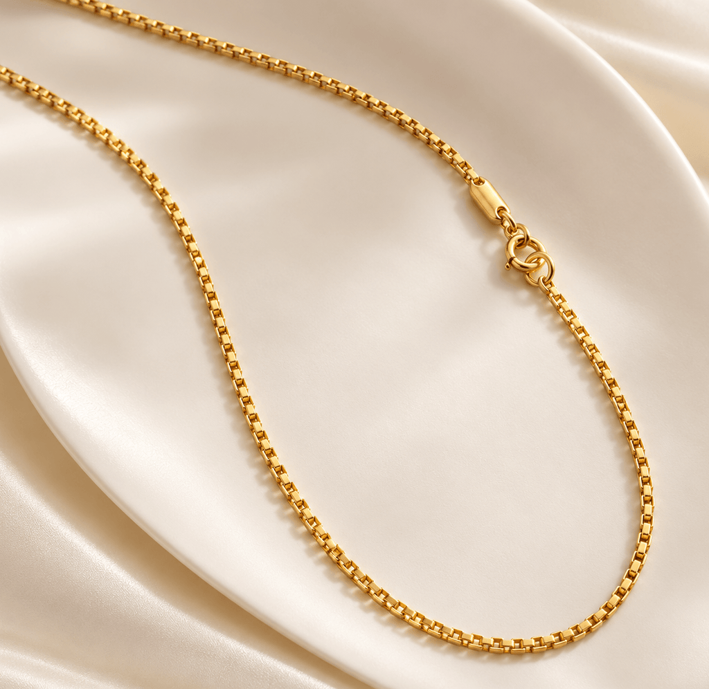 The Square Link Chain Necklace in 14-karat Yellow Gold by AME Jewellery is a distinctive and modern jewelry piece crafted with square-shaped links.