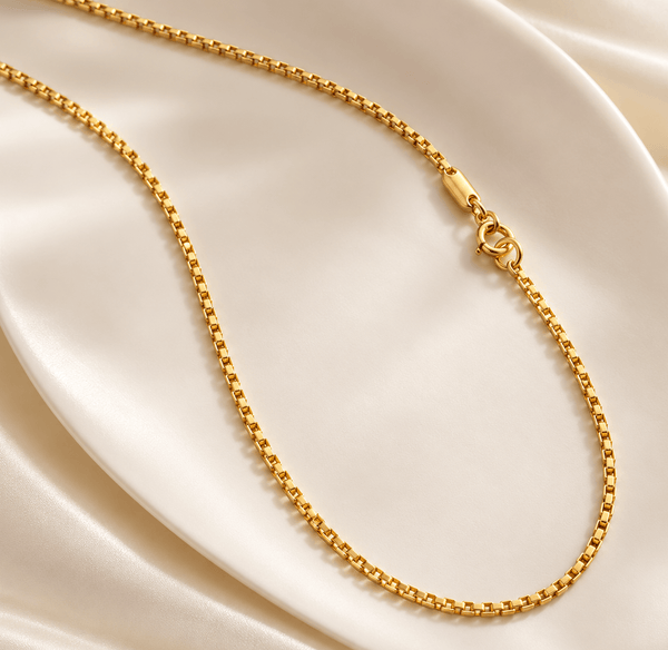 The Square Link Chain Necklace in 14-karat Yellow Gold by AME Jewellery is a distinctive and modern jewelry piece crafted with square-shaped links.