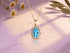natural pear-cut blue topaz pendant necklace in 14K yellow gold by AME Jewellery