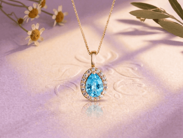 natural pear-cut blue topaz pendant necklace in 14K yellow gold by AME Jewellery