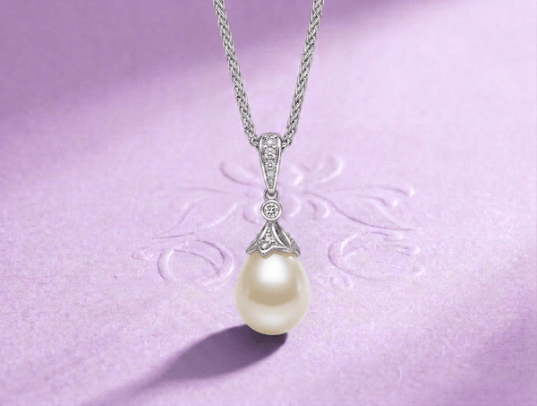 White or Peacock Green Teardrop Freshwater Cultured Pearl Pendant Necklace in Sterling Silver by AME Jewellery. 