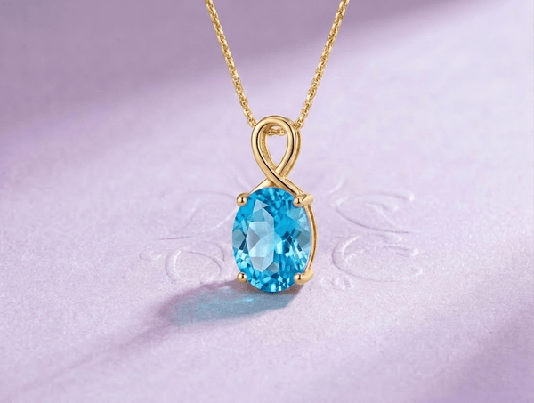 Natural Oval -cut Blue Topaz Pendant Necklace in 18K Yellow Gold by AME Jewellery. Blue Topaz is the December Birthstone and the 4th wedding anniversary gemstone. 