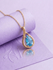 Natural Pear-shaped Blue Topaz Pendant in 14K Yellow Gold by AME Jewellery.