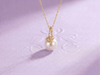 White Freshwater Cultured Pearl Leaf Pendant Necklace in 14-karat Yellow Gold by AME Jewellery.