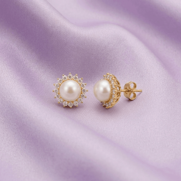 Drawing inspiration from the vibrant beauty of the sunflower, AME Jewellery presents our exquisite White Freshwater Cultured Pearl Sunflower Earrings in 14-karat Yellow Gold by AME Jewellery. 
