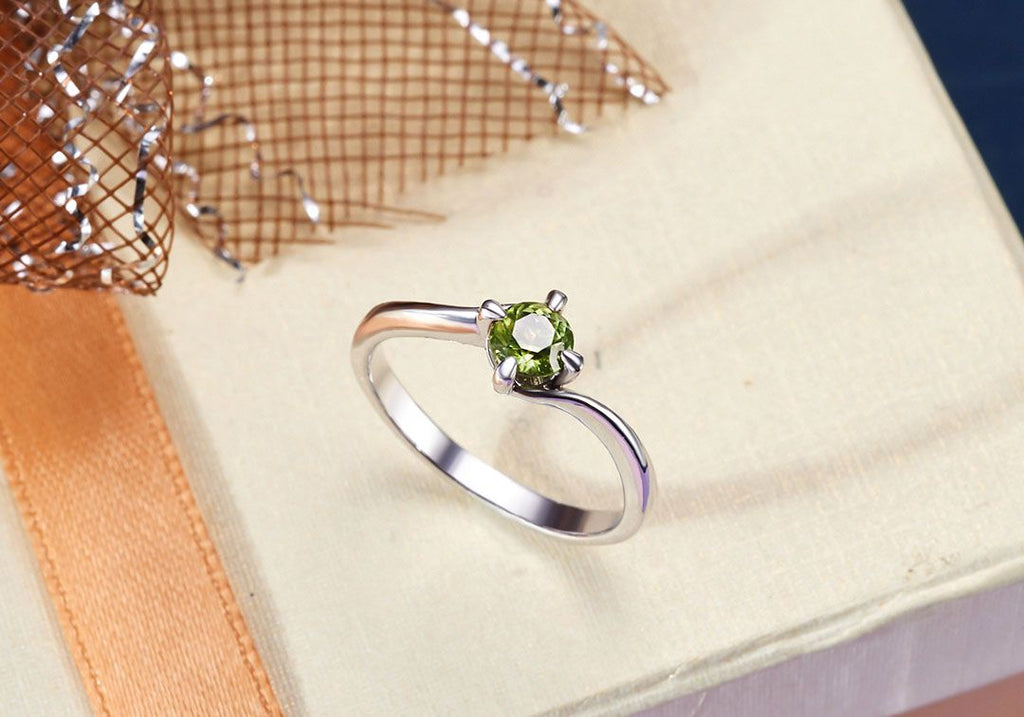 Nhẫn nữ Đá quý thiên nhiên Peridot solitaire twist ring in sterling silver by AME Jewellery